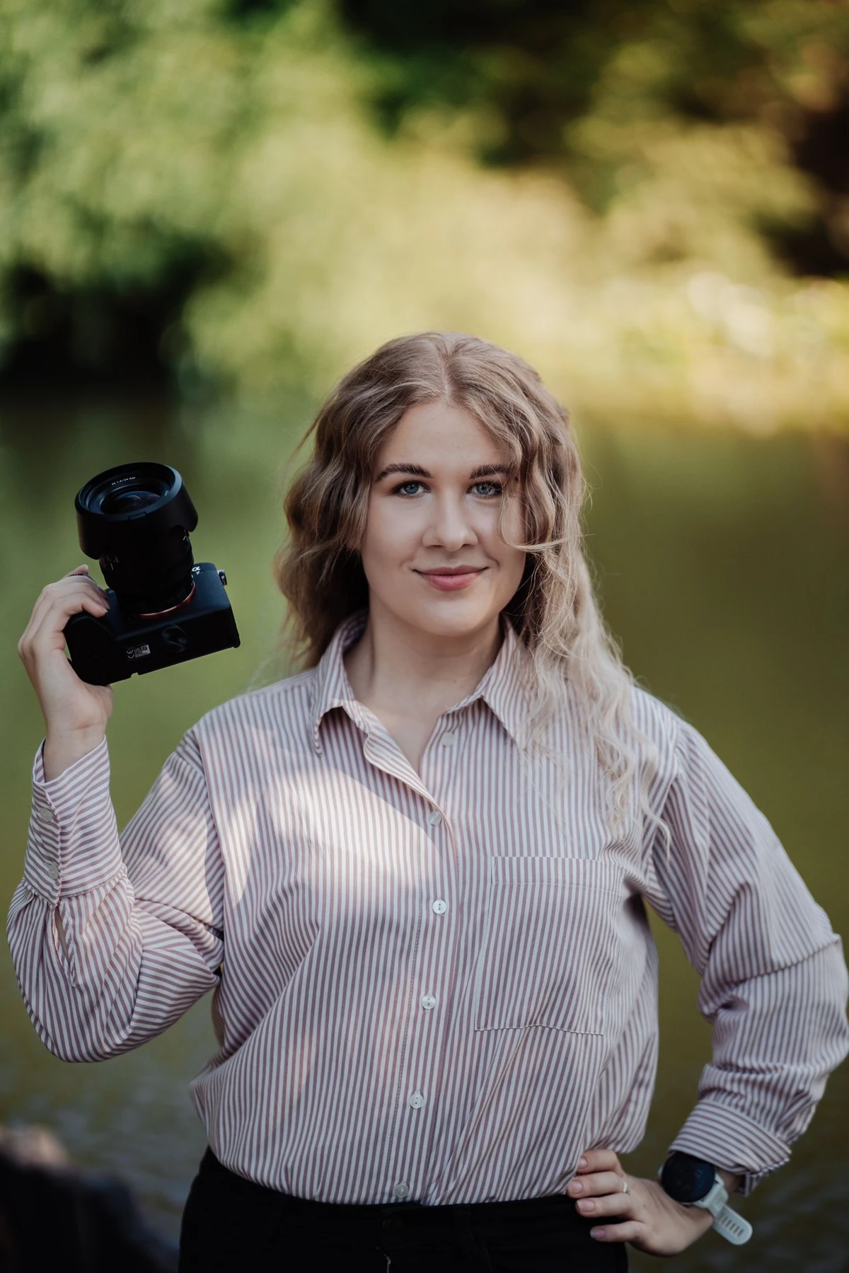 A portrait photo of Asia, a wedding photographer based in Newport, South Wales